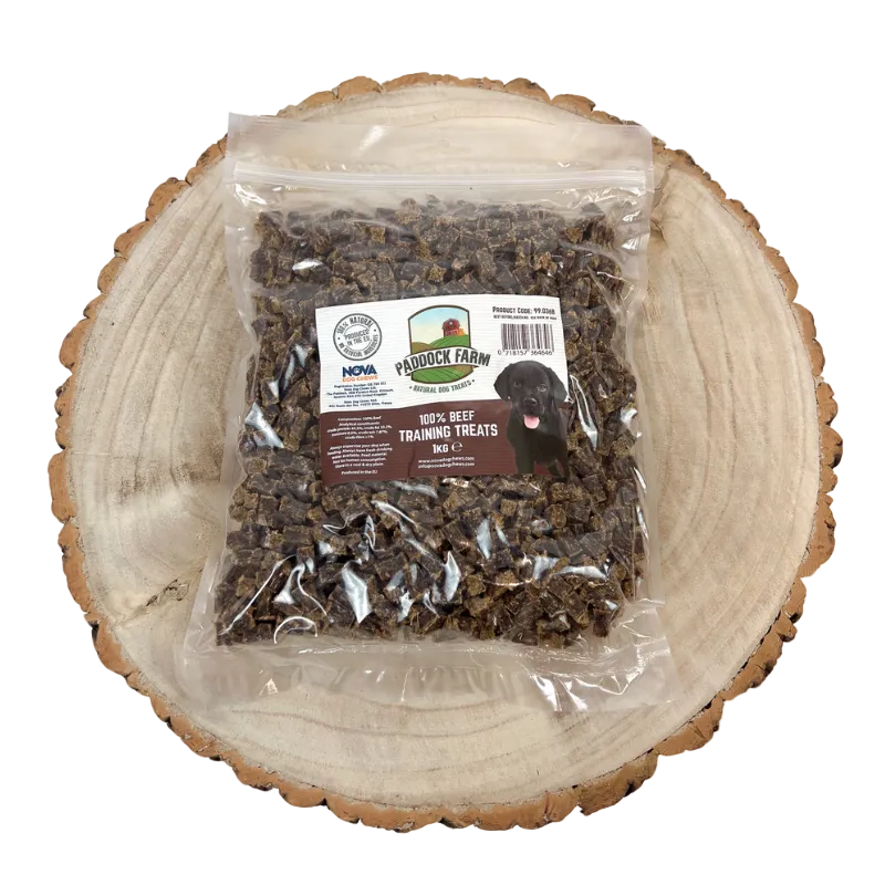 Package of Paddock Farm dog treats on a wooden surface